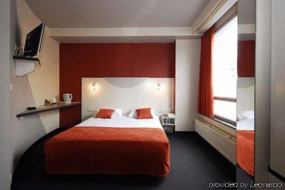 Green Hotel Genk Quarto foto